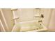 Bathroom featuring a bathtub and shower combination with built-in shelves and chrome faucet at 2929 Rambler Dr, Loganville, GA 30052