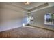 Spacious bedroom featuring ample natural light and plush carpeting at 2929 Rambler Dr, Loganville, GA 30052