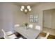 Cozy dining area features a modern chandelier and a table with seating for six at 2929 Rambler Dr, Loganville, GA 30052