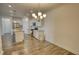 Open concept dining room and kitchen with stainless steel appliances at 2929 Rambler Dr, Loganville, GA 30052