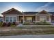 Inviting single-story home with brick accents and manicured landscaping at 2929 Rambler Dr, Loganville, GA 30052