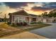 Beautiful single-story home with landscaped yard at sunset at 2929 Rambler Dr, Loganville, GA 30052