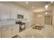 Modern kitchen features granite countertops, stainless steel appliances, and ample cabinet space at 2929 Rambler Dr, Loganville, GA 30052