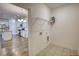 Laundry room area showing the connection to the kitchen at 2929 Rambler Dr, Loganville, GA 30052