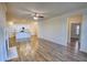 Open-concept living room boasts wood floors and seamless transition to kitchen at 2929 Rambler Dr, Loganville, GA 30052
