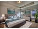 Bright main bedroom featuring a king bed, art, and natural light at 2929 Rambler Dr, Loganville, GA 30052