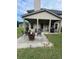 A backyard patio featuring an outdoor seating area at 4482 Ridge Mill Ne Ter, Douglasville, GA 30135