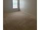 Spacious bedroom with neutral carpet and natural light at 4482 Ridge Mill Ne Ter, Douglasville, GA 30135