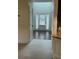 Bright entryway with white door and sidelights, opening to hardwood floors at 4482 Ridge Mill Ne Ter, Douglasville, GA 30135