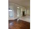 Open concept living room with hardwood floors and stone fireplace at 4482 Ridge Mill Ne Ter, Douglasville, GA 30135