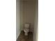 Small water closet area with toilet and tile floor at 4482 Ridge Mill Ne Ter, Douglasville, GA 30135