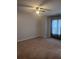 Spacious bedroom with plush carpeting, ceiling fan, and lots of natural light at 5425 Village Green Sq, Norcross, GA 30093