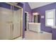 Bright bathroom featuring a glass-enclosed shower at 930 Cedar Bluff Sw Trl, Lilburn, GA 30047