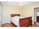 Cozy bedroom features wood flooring, natural light, and ample space at 930 Cedar Bluff Sw Trl, Lilburn, GA 30047