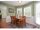 Cozy dining area with natural light from large windows at 930 Cedar Bluff Sw Trl, Lilburn, GA 30047