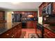Spacious kitchen with wooden cabinets, granite countertops, and stainless steel appliances at 930 Cedar Bluff Sw Trl, Lilburn, GA 30047