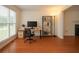 Bright office with a large window, desk, and stylish decor at 930 Cedar Bluff Sw Trl, Lilburn, GA 30047