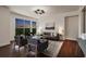 Modern living room featuring hardwood floors, stylish seating, and large windows with natural light at 1820 Peachtree St # 1607, Atlanta, GA 30309