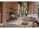 Cozy outdoor lounge area with a fireplace and comfortable seating perfect for relaxing and socializing at 1820 Peachtree St # 1607, Atlanta, GA 30309
