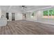 Finished basement with hardwood floors, recessed lighting, and a bar area for entertaining at 2517 Hampton Park Ct, Marietta, GA 30062
