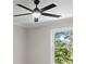 Bright bedroom with a ceiling fan and a window view of the lush outdoors at 2517 Hampton Park Ct, Marietta, GA 30062