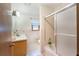 Classic bathroom featuring a shower-tub combo and single sink vanity at 5670 Lanny Dr, Powder Springs, GA 30127