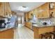 Spacious kitchen featuring ample cabinet space, stainless steel appliances, and granite countertops at 5670 Lanny Dr, Powder Springs, GA 30127