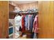 This walk-in closet features ample hanging space and shelving to maximize storage space at 5670 Lanny Dr, Powder Springs, GA 30127