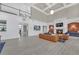 Spacious clubhouse featuring wood look floors, high ceilings, and modern decor at 6206 Carriage Gate Se Ln # 6, Mableton, GA 30126