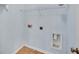 Laundry room featuring tile floors, utility connections, a hanging rack, and a neutral color scheme at 6206 Carriage Gate Se Ln # 6, Mableton, GA 30126