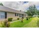 Well-maintained home with manicured lawn and garden featuring a inviting walkway to the front entrance at 1321 Waterton Trl, Douglasville, GA 30134