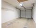 Spacious garage with white walls and concrete flooring at 1321 Waterton Trl, Douglasville, GA 30134