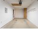 Spacious garage with white walls and concrete flooring at 1321 Waterton Trl, Douglasville, GA 30134