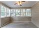 Cozy sun room featuring lots of windows that let in plenty of natural light at 1321 Waterton Trl, Douglasville, GA 30134
