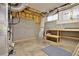 Unfinished basement area ready for customization with exposed ductwork and concrete flooring at 4963 Kingsbridge Ct, Powder Springs, GA 30127