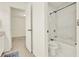 Bathroom view into the toilet and shower area at 4963 Kingsbridge Ct, Powder Springs, GA 30127