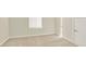 Neutral bedroom with window and closet space at 4963 Kingsbridge Ct, Powder Springs, GA 30127