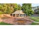 Gazebo with picnic tables is next to the tennis court at 4963 Kingsbridge Ct, Powder Springs, GA 30127