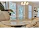 Close up of a bright kitchen island and view of a deck through the windows at 4963 Kingsbridge Ct, Powder Springs, GA 30127