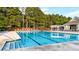 Large community pool has multiple lap lanes and ample lounging space at 4963 Kingsbridge Ct, Powder Springs, GA 30127