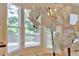 The bright sunroom with lots of natural light provides relaxing views of the yard at 4963 Kingsbridge Ct, Powder Springs, GA 30127
