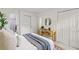 Bright bedroom featuring soft carpet, modern shelving, and natural light at 5999 Brookside Se Ln, Mableton, GA 30126