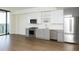 Modern kitchen featuring stainless steel appliances, white cabinets, and hardwood floors at 788 W Marietta Nw St # 311, Atlanta, GA 30318