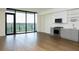 Modern kitchen with stainless steel appliances and a large window offering natural light and beautiful outdoor views at 788 W Marietta Nw St # 311, Atlanta, GA 30318
