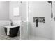 Bathroom featuring a clawfoot tub, a walk-in shower with black and white tile accent, and patterned floor at 1364 Westboro Sw Dr, Atlanta, GA 30310