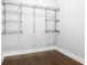 Empty closet with hardwood floors, and an adjustable wire shelving system at 1364 Westboro Sw Dr, Atlanta, GA 30310