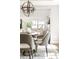 Bright dining room features modern chandelier with views to living areas at 1364 Westboro Sw Dr, Atlanta, GA 30310