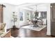 Open dining area with tray ceiling and view of living areas at 1364 Westboro Sw Dr, Atlanta, GA 30310