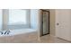 Bright bathroom features a soaking tub, glass shower, and tile surround at 171 Osier Dr, Mcdonough, GA 30252