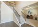 Elegant foyer with hardwood floors, staircase, and a view to the coffered ceiling office at 171 Osier Dr, Mcdonough, GA 30252